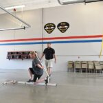 Beacon orthopedics team testging Amberley Village Fire and Police Dept. mobility, while demonstrating rehabilitative strategies you can do at home to relieve pain.