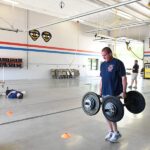Beacon orthopedics team collaborating with the Amberley Village police department on strength training exercises you can do at home to build endurance.