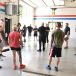 Amberley Village fire department complete a fitness test led by the Beacon Orthopaedics Tactical team.