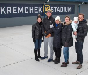 The Kremchek family in front of Kremchek Stadium
